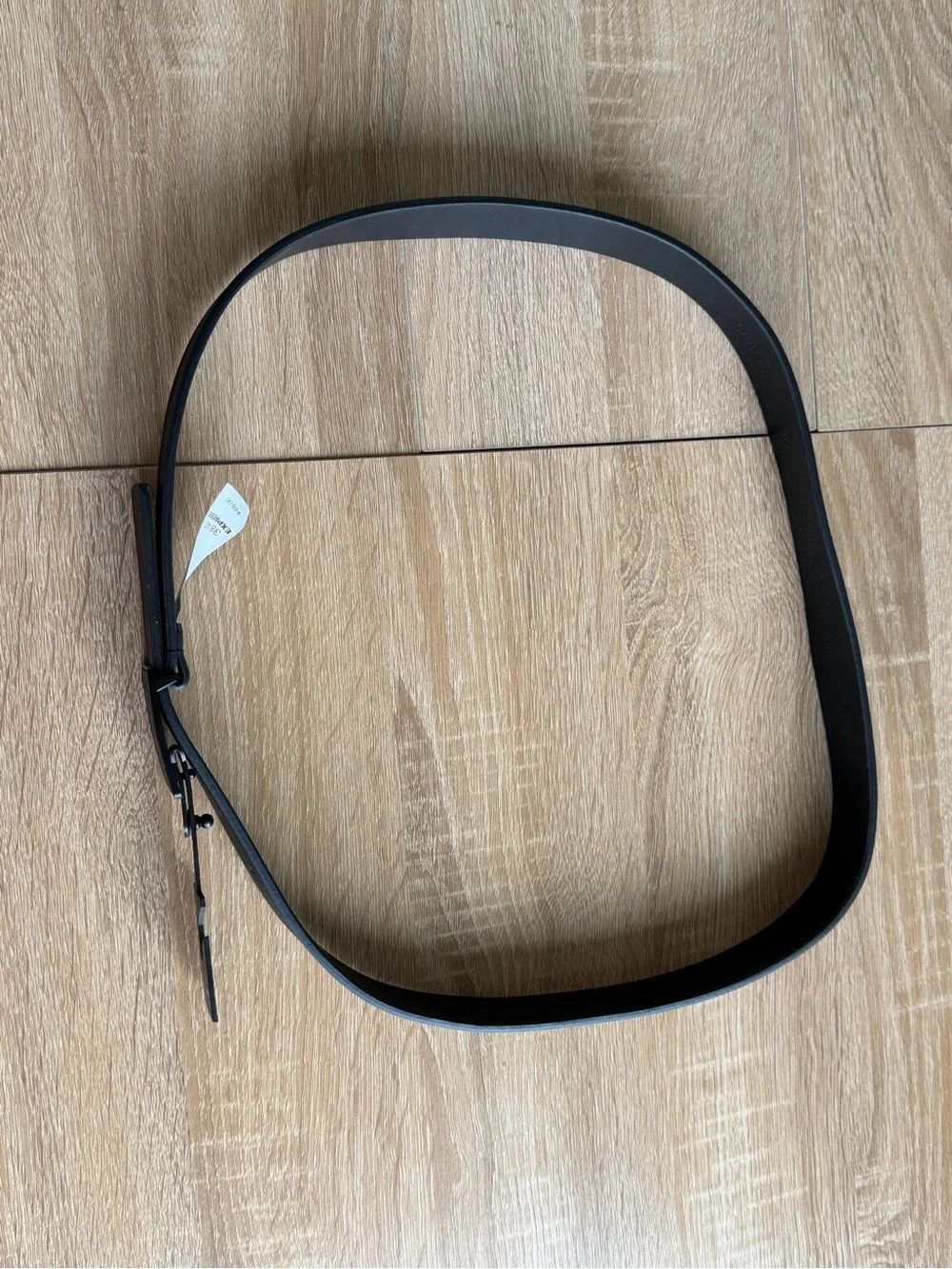 NEW with TagExpress black leather belt with textured buckle, size 38/40